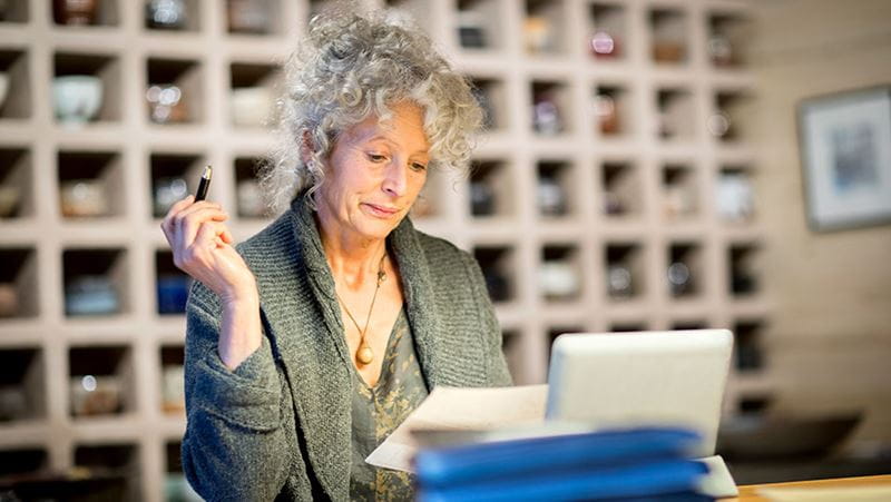 Mature woman working in studio